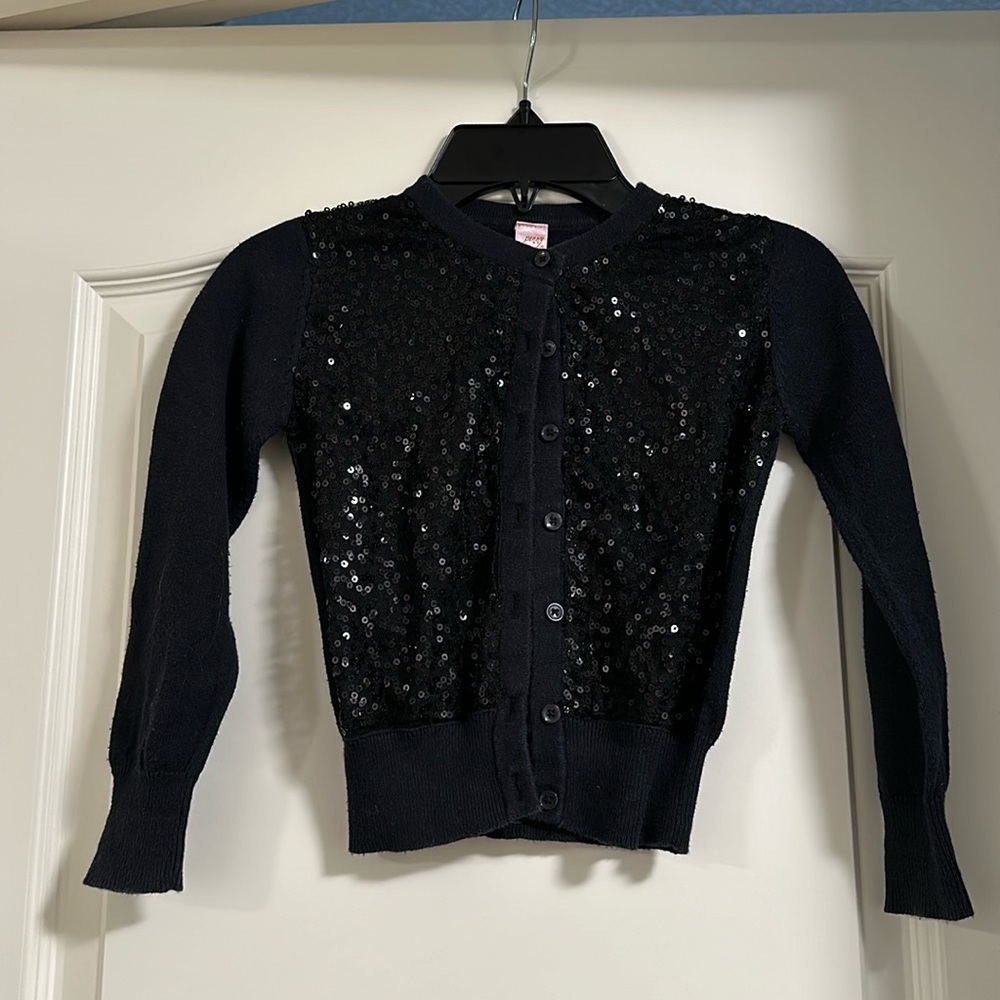 Black sparkly sweater with buttons, size 5
